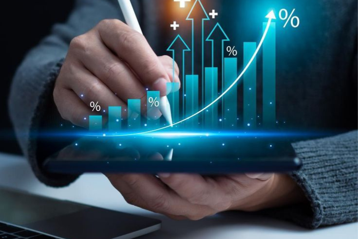 Hand drawing growth chart on tablet